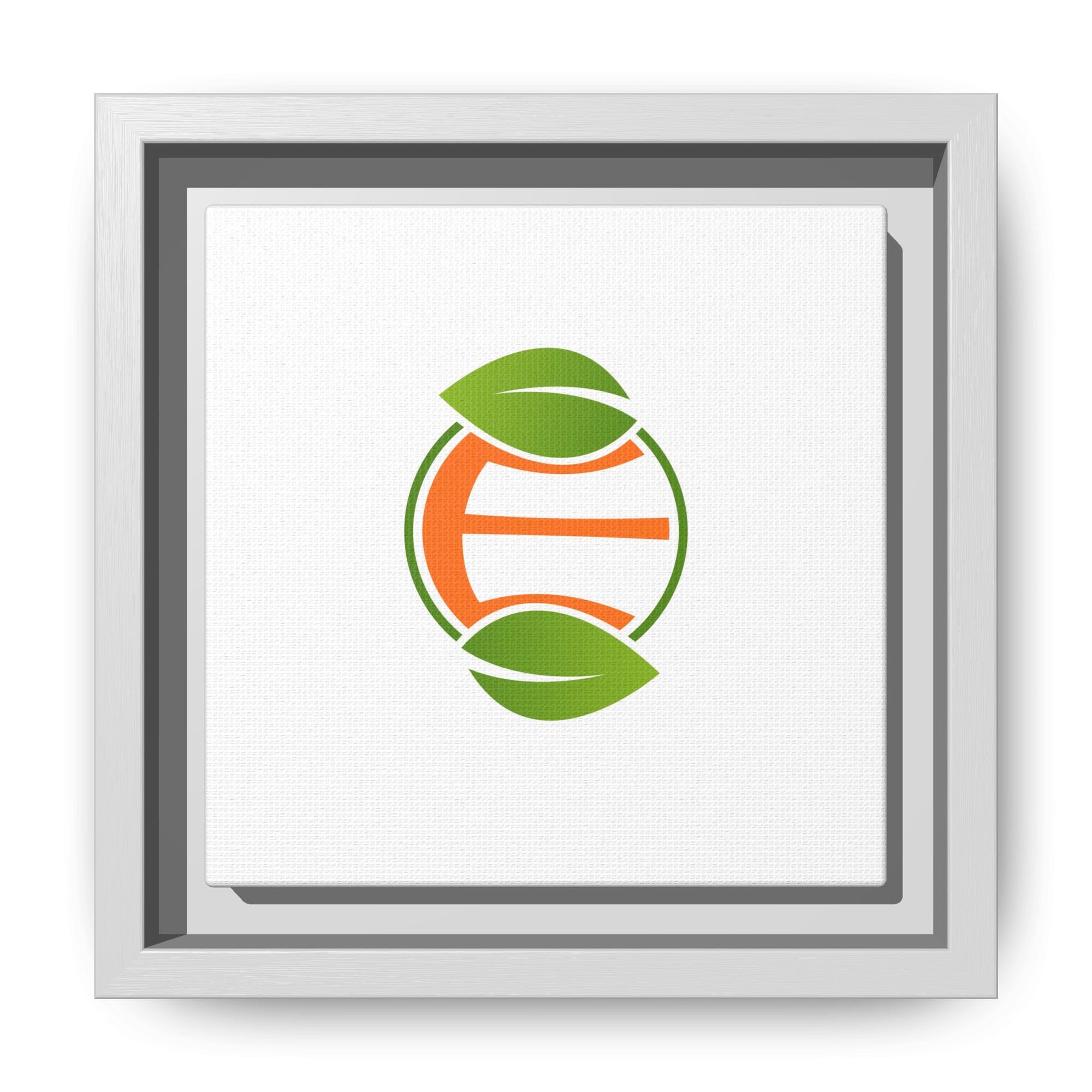 Framed Matte Canvas Print — Minimal Green Orange Leaf Logo Wall Art