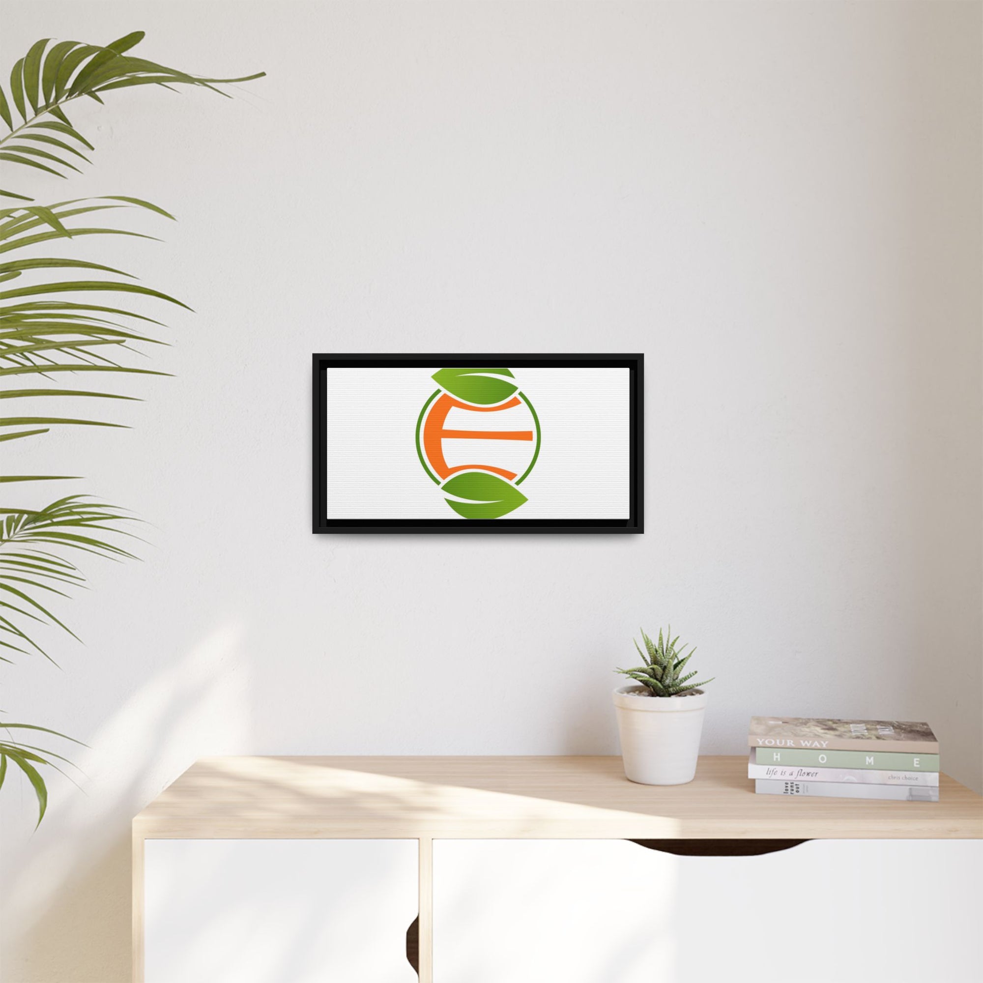 Framed Matte Canvas Print — Minimal Green Orange Leaf Logo Wall Art